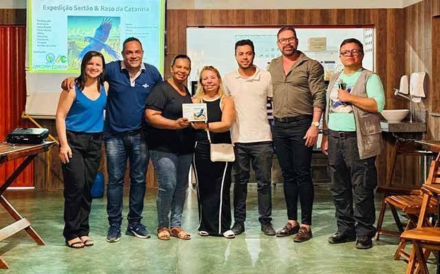 Registro de grupo durante as palestras, publicado na matéria de Santa Brígida.